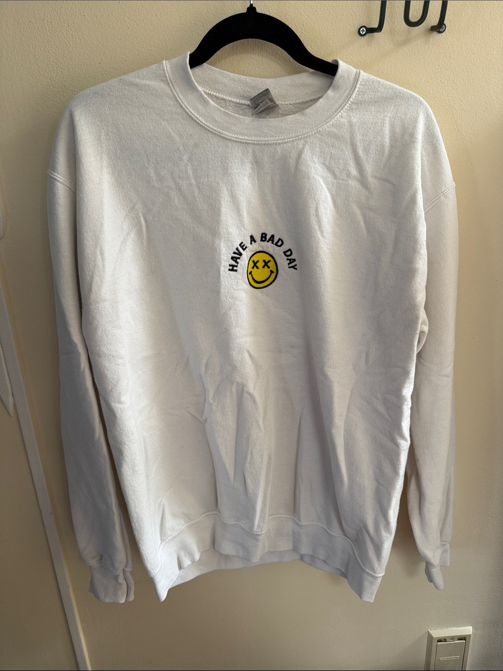 Gildan White Crewneck Sweatshirt with Yellow Smiley and Black Text